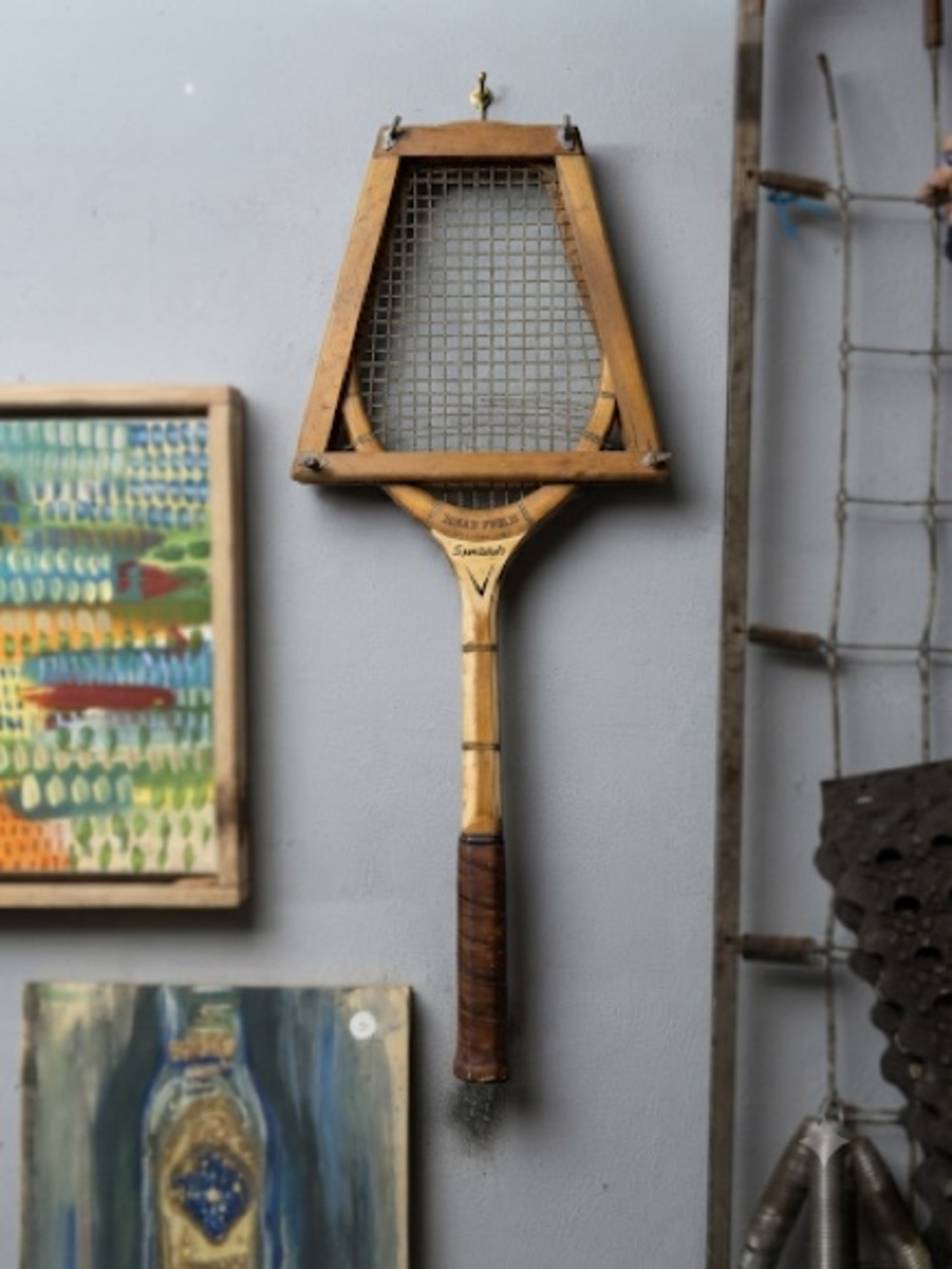 : A Rare and Unique Late 19th-Century Triangular Wooden Tennis Racket with Integ